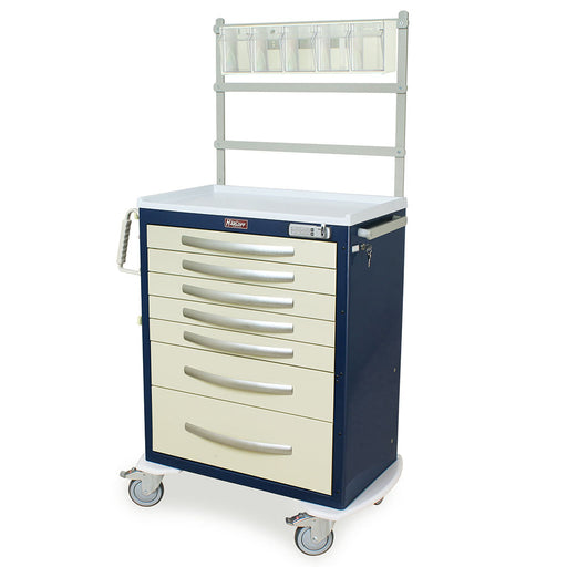 A medical cart with multiple drawers sits on wheels. It features a top shelf and is dark blue and light beige.