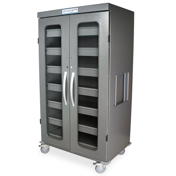 A gray, double-doored cabinet with multiple shelves sits on wheels. The cabinet is designed for storage, with clear panels revealing the interior shelves. MEDSTORMAX is printed on the top.