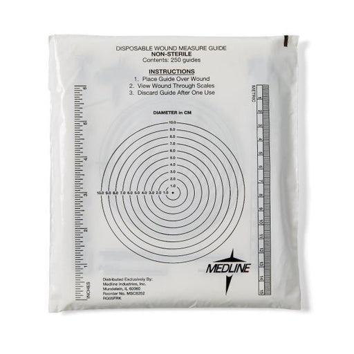 A disposable wound measure guide, contained in a plastic packet, is used to measure wound diameter using concentric circles and ruler scales in centimeters and inches.