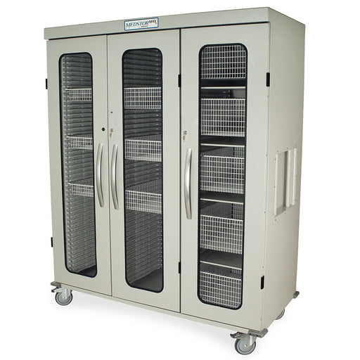 A MEDSTORMAX cabinet stands on wheels; it has three sections with wire baskets and glass doors, providing storage.
