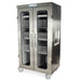 A stainless steel cabinet, containing numerous wire baskets, sits on wheels. MEDSTORMAX is printed on the top.