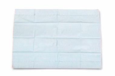 A light-blue sheet of paper is folded in a rectangular pattern; it lies flat against a white background.