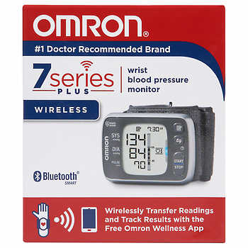 A black Omron 7 Series Plus blood pressure monitor rests on its packaging; the box displays product information and features. The model number is shown as BP786.