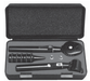 A black otoscope set rests open in its black carrying case. The set includes a handle, several specula, and other small parts.