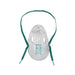 A clear plastic oxygen mask, featuring green elastic straps, rests on a white background.