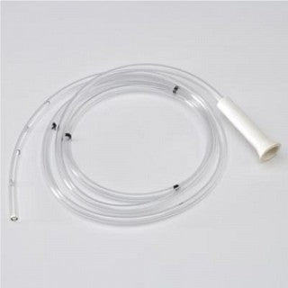 A translucent medical tube, coiled on a white surface, features several small, dark connectors along its length and a single, opaque white connector at one end.