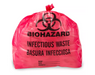 A pink biohazard bag contains infectious waste. The bag displays "BIOHAZARD," "INFECTIOUS WASTE," "BASURA INFECCIOSA," and spaces for name, date, and address.