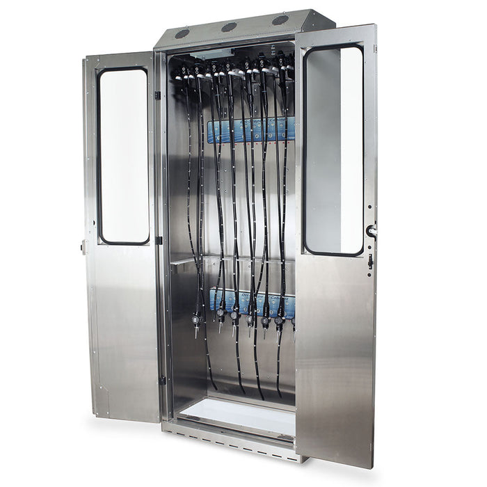A stainless steel cabinet stores multiple flexible tubes with gauges at the bottom; its doors are open, revealing the contents.