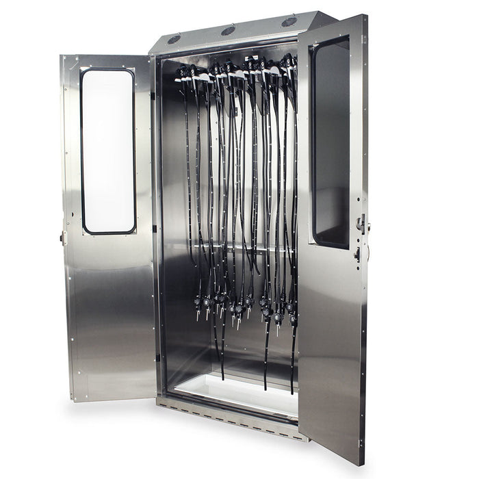 A stainless steel cabinet stores numerous endoscopes hanging vertically; its doors are open, revealing a white tray at the base.