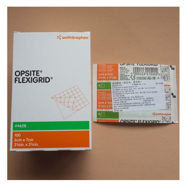 A box of OPSITE FLEXIGRID bandages sits on a surface. The box contains 100 bandages, each measuring 6cm x 7cm (2 3/8in x 2 3/4in). A single bandage is shown separately.