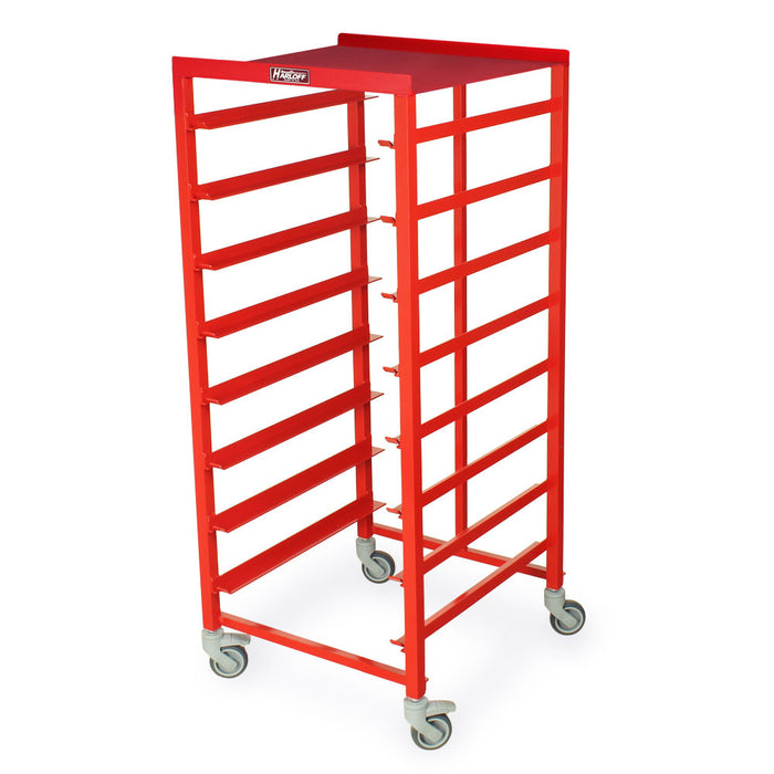 A red metal rack with multiple shelves stands on wheels. It is likely used for storage or transport.