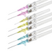 Several intravenous catheters, with color-coded hubs, are arranged in a slightly overlapping, slightly angled stack against a plain white background.