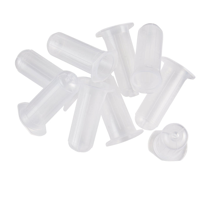 Several small, clear plastic tubes are loosely piled together on a white background.