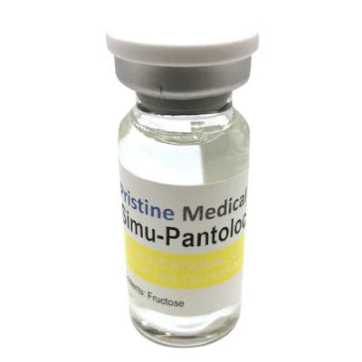 A small, clear glass vial containing a liquid sits on a surface. The vial has a white cap and a label that reads: "Pristine Medical Simu-Pantoloc". Ingredients: Fructose.