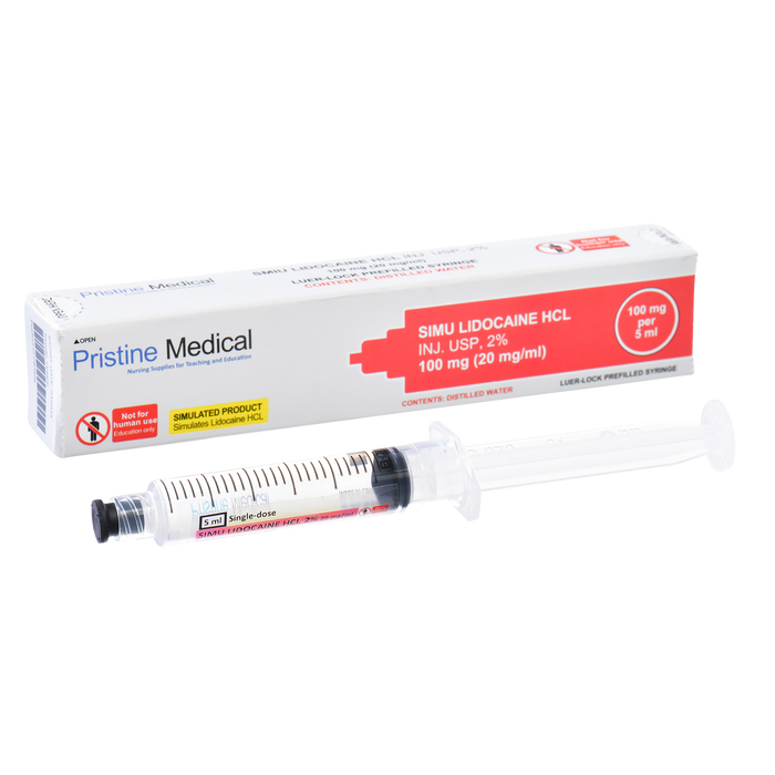 Simu Lidocaine HCl, 5ml Prefilled Syringe
A prefilled 5ml syringe containing simulated lidocaine lies next to its packaging; both are for educational purposes only. The box indicates the contents are 100mg (20mg/ml) of Simu Lidocaine HCL.
