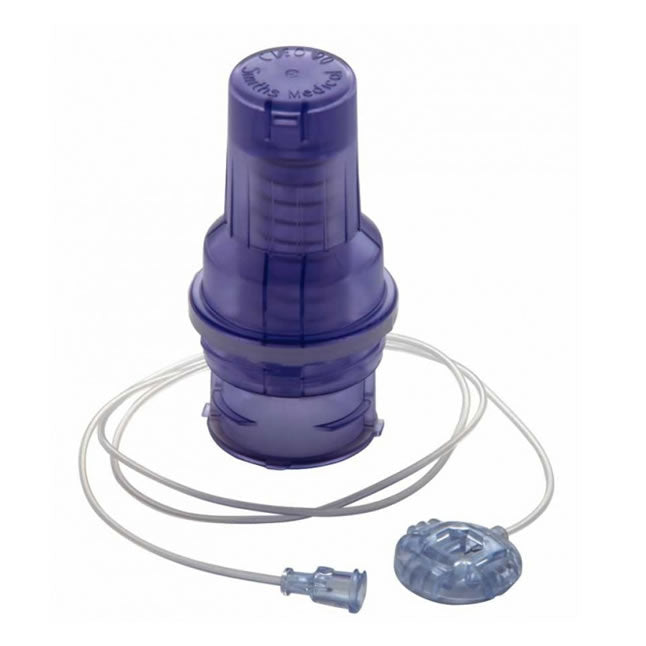 A purple, transparent medical device, possibly a pressure regulator, sits connected to a thin tube on a white background. The top reads "CV-00 Smiths Medical".