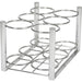A chrome rack holds twelve cylindrical containers. It provides storage, likely in a commercial or industrial setting.