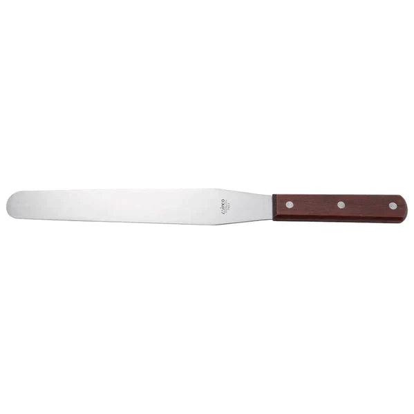 A metal spatula with a dark brown wooden handle rests on a plain white background.