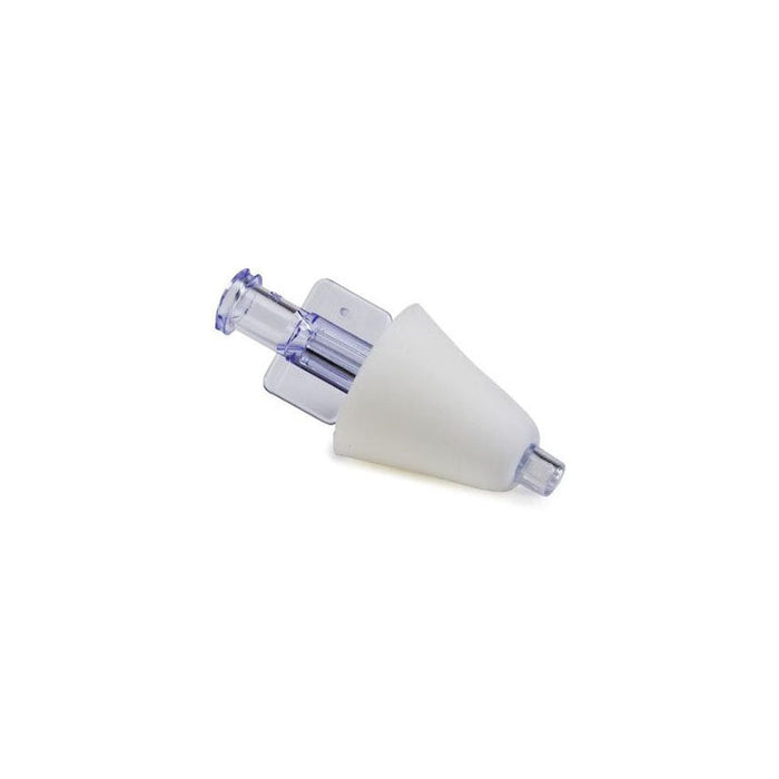 A medical connector, comprised of a clear plastic piece and a white cone, rests on a white background.