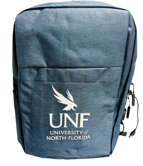 A blue backpack, displaying the UNF logo and “UNIVERSITY of NORTH FLORIDA,” stands against a black background.