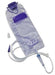A flexible, gray pouch with tubing and a purple label hangs. It is likely used for medical fluid collection or administration, possibly in a clinical setting.