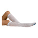 A pair of white knee-high socks are worn by a person whose legs are lying down on a white background. A small blue detail is visible at the toes of the socks.