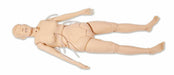 A medical training mannequin lies supine, showing IV lines; on a white background.