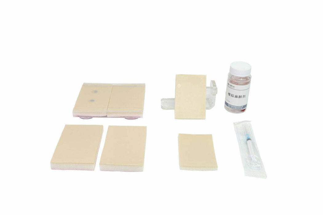 Several beige practice skin patches and a clear plastic holder sit beside a bottle of solution and syringe; all are arranged on a white surface.