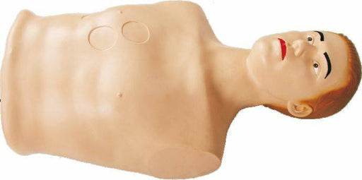 A CPR training dummy torso rests with its head tilted back on a white surface. It has pale skin and red painted lips.