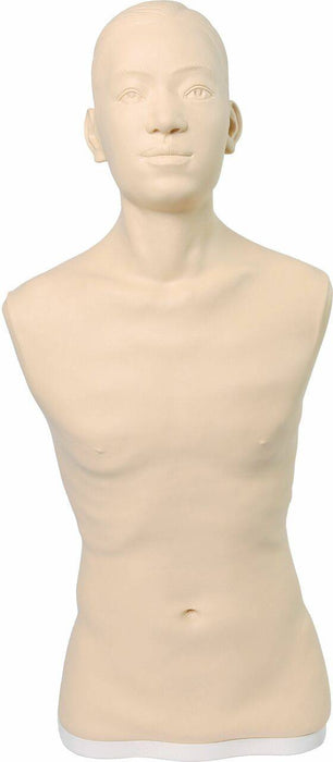 A tan-colored mannequin with visible ribs stands still, filling the frame from the head down to the mid-torso, against a white background.