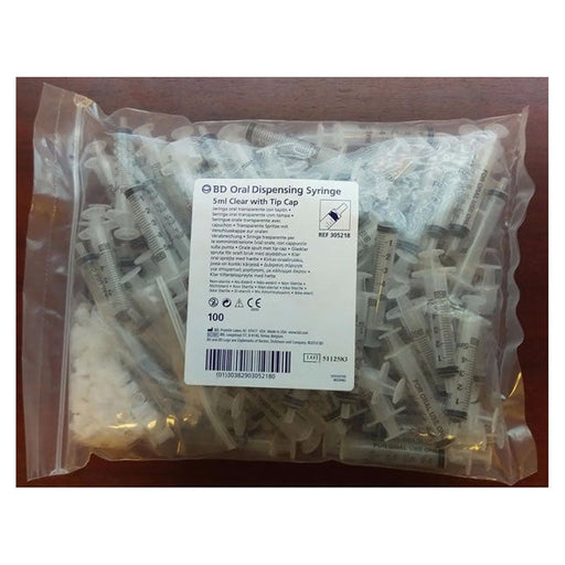 A bag of one hundred 5ml oral dispensing syringes, with tip caps, are contained within a plastic bag.