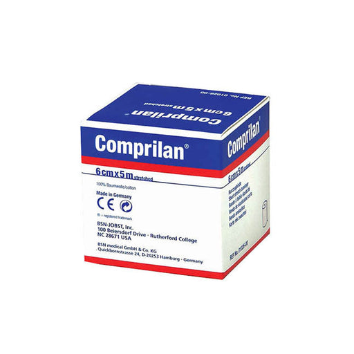 A Comprilan bandage box sits on a white background. The box is labeled with size, manufacturer details, and country of origin.