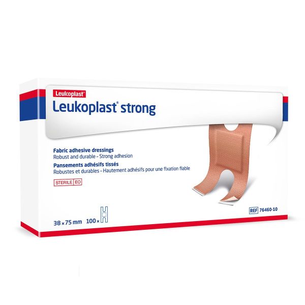 A box of Leukoplast strong fabric adhesive dressings sits on a white background. The box displays 100 bandages, each measuring 38 x 75 mm. The bandages are robust and durable, providing strong adhesion. REF 76460-10.