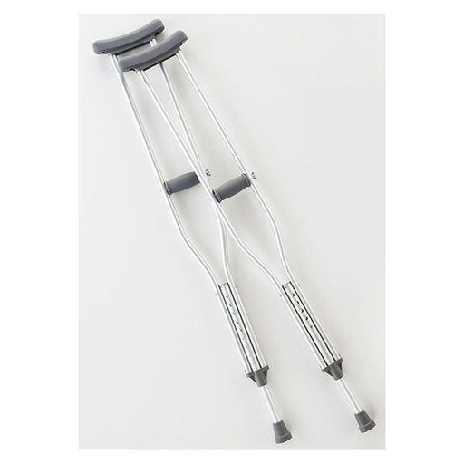 Two aluminum crutches rest on a white surface. They are positioned for use, suggesting support for mobility.
