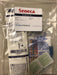 A "Seneca Nasogastric Kit" floats inside of a clear plastic bag, including a syringe catheter tip, a stomach tube, alcohol swabs, and a pH chart, distributed by Pristine Medical.