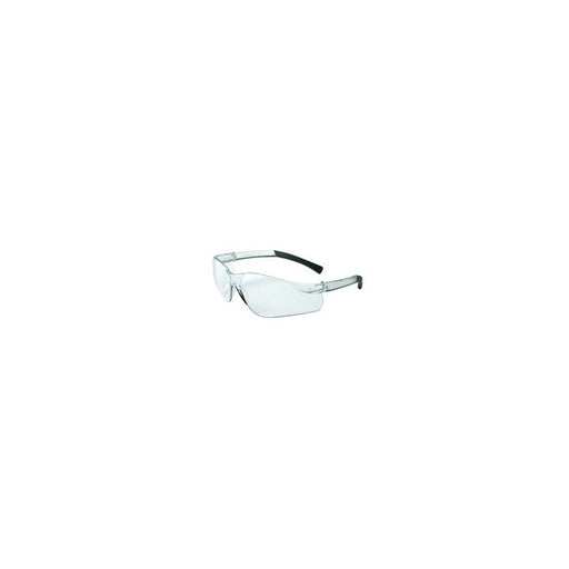 Clear safety glasses sit at an angle against a plain white background.