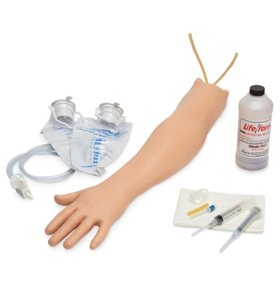 A realistic artificial arm lies on a surface, next to intravenous fluid bags, syringes, and a bottle labeled "Life/form ARTIFICIAL BLOOD".