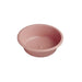 A pink plastic basin sits on a white background.