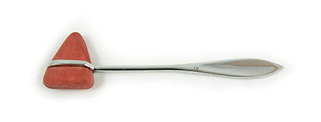 A red reflex hammer, a medical diagnostic tool, rests horizontally against a plain, white background. The handle is silver.