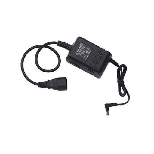 A black, rectangular AC adapter sits on a white surface, with two black cables extending from it. One cable ends in a female plug, and the other ends in a small, right-angled male plug.