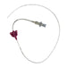 A medical catheter is coiled in a white space, featuring a purple butterfly clip at one end, a clear hub in the middle, and markings along its length.